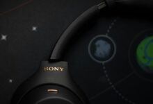 Black sony headphones on a starry background