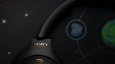 Black sony headphones on a starry background